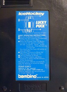 The Lucky Puck Ice Hockey electronic game by Bambino - rear panel instructions.